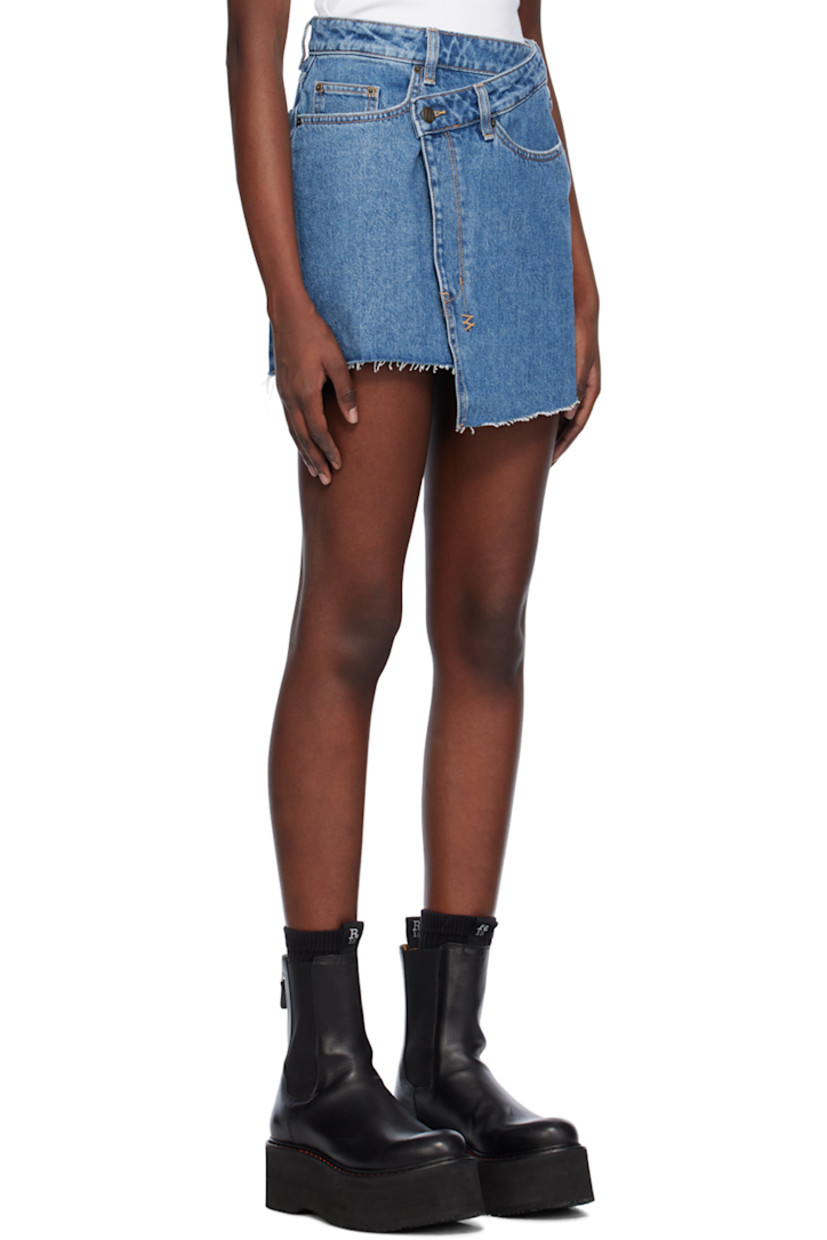 Non-stretch denim skirt. Fading and distressing throughout.

· Asymmetrical wrap construction
· Belt loops
· Five-pocket styling
· Zip-fly
· Frayed edge at hem
· Logo embroidered at back

Supplier color: Heritage