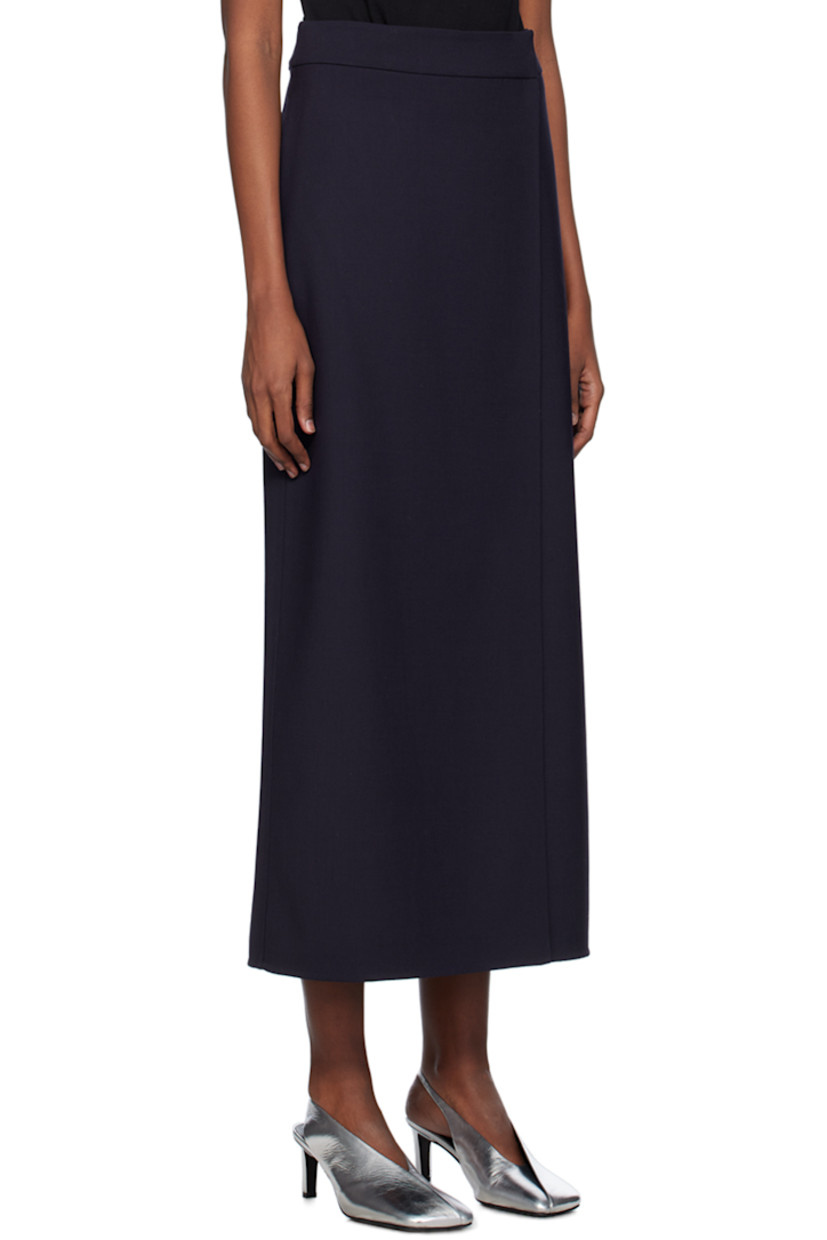 Stretch virgin wool twill skirt.

· Wrap construction
· Belt loops
· Two-pocket styling
· Central vent at front and back hem

Supplier color: Eggplant