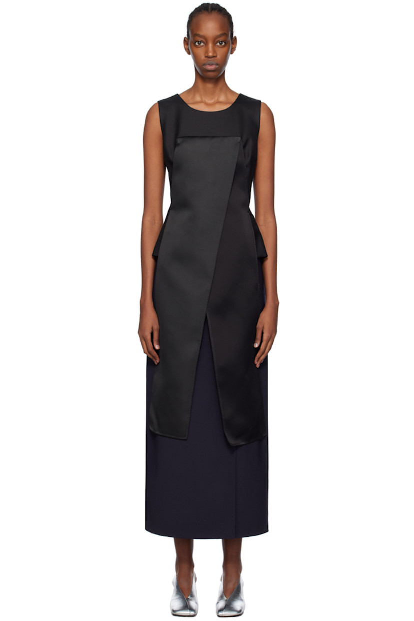 Stretch silk twill blouse. 

· Layered construction
· Round neck
· Darts at chest
· Offset vent extends from hem to chest
· Zip closure at back collar

Supplier color: Black