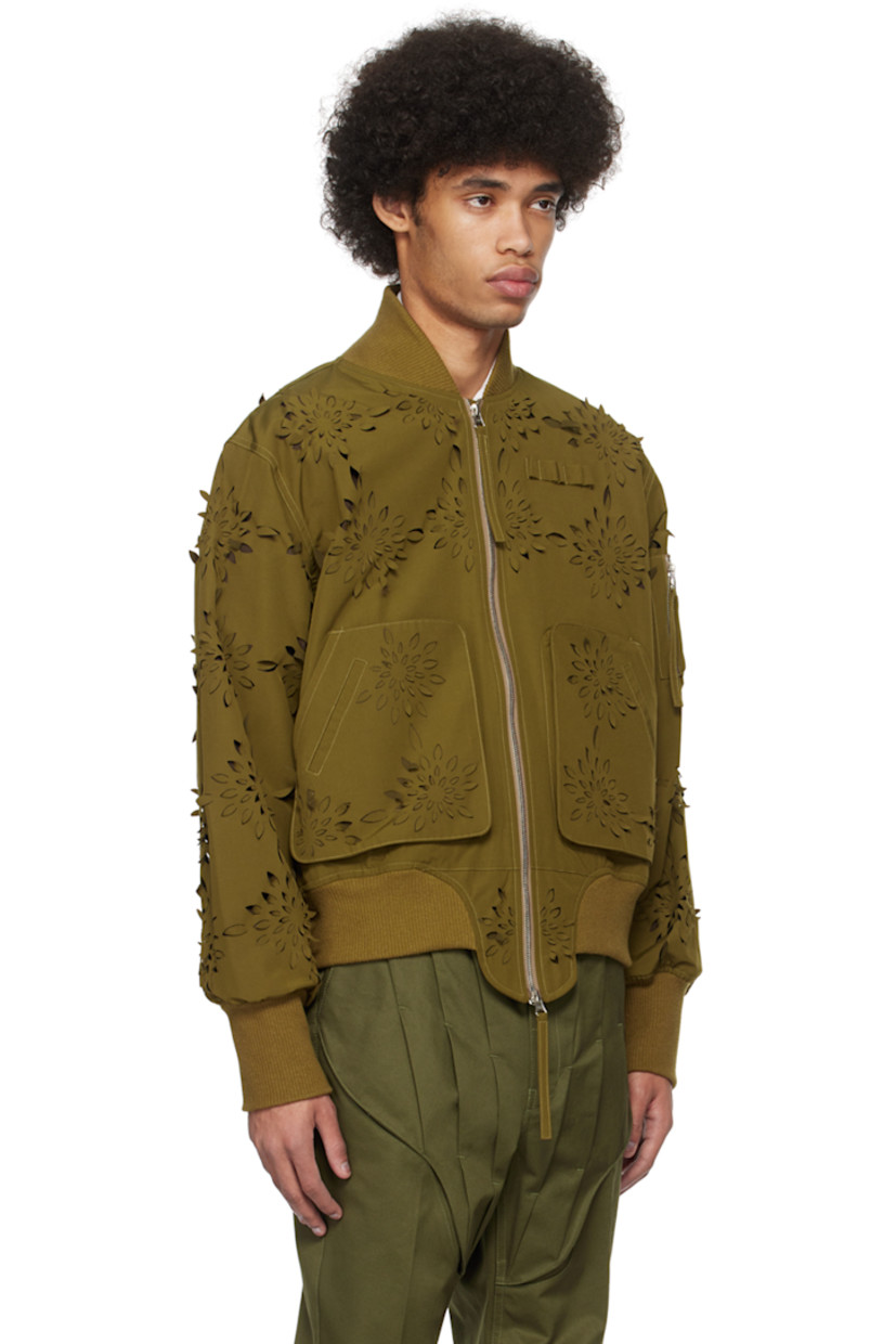 Polyester- and cotton-blend canvas bomber jacket. Laser-cut floral detailing throughout.

· Paneled construction
· Rib knit stand collar, asymmetric hem, and cuffs
· Two-way zip closure
· Loops at chest
· Welt and patch pockets
· Dropped shoulders
· Utility pocket and logo flag at sleeve
· Welt pocket at interior
· Full polyester taffeta lining

Supplier color: Yellow/Green