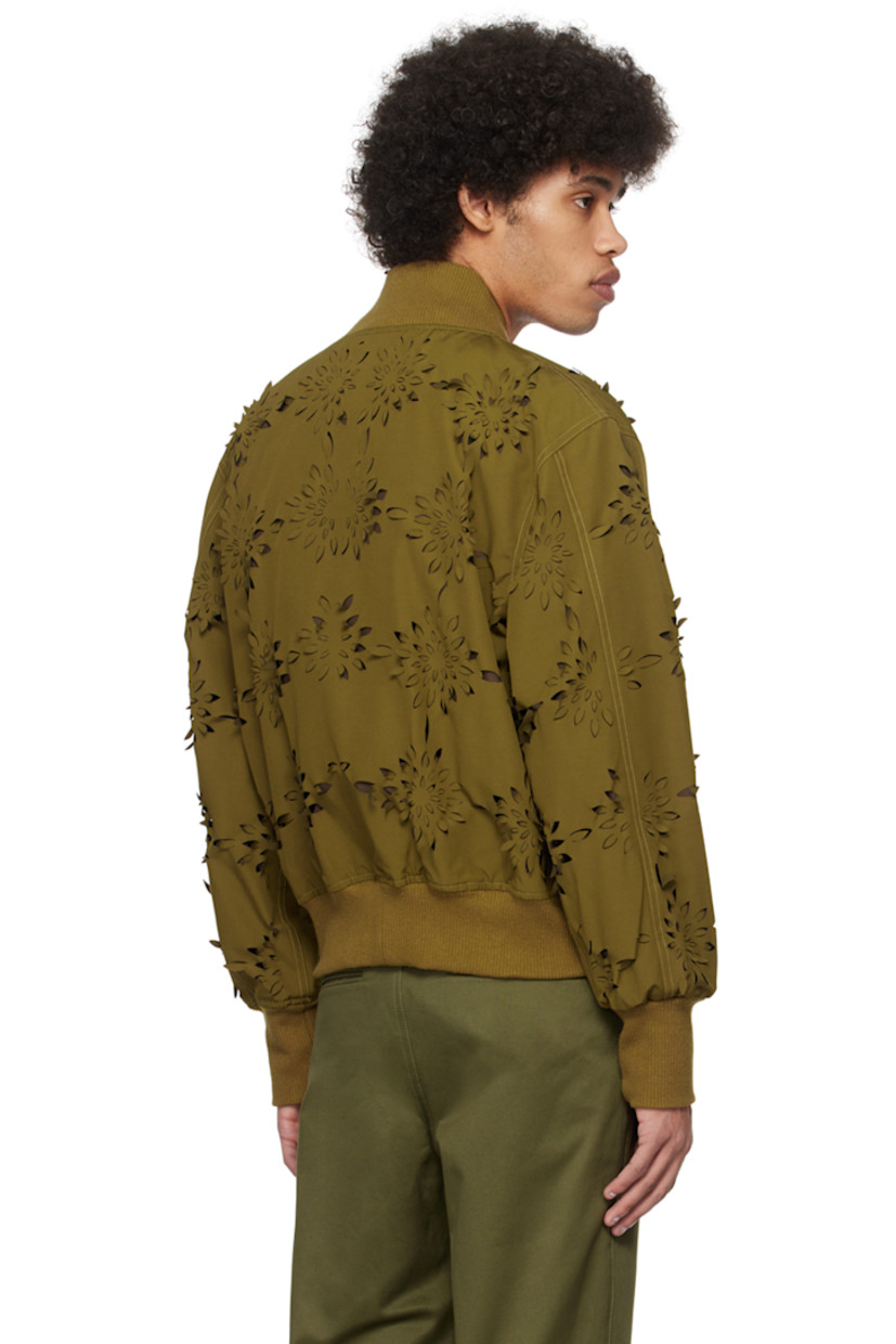 Polyester- and cotton-blend canvas bomber jacket. Laser-cut floral detailing throughout.

· Paneled construction
· Rib knit stand collar, asymmetric hem, and cuffs
· Two-way zip closure
· Loops at chest
· Welt and patch pockets
· Dropped shoulders
· Utility pocket and logo flag at sleeve
· Welt pocket at interior
· Full polyester taffeta lining

Supplier color: Yellow/Green