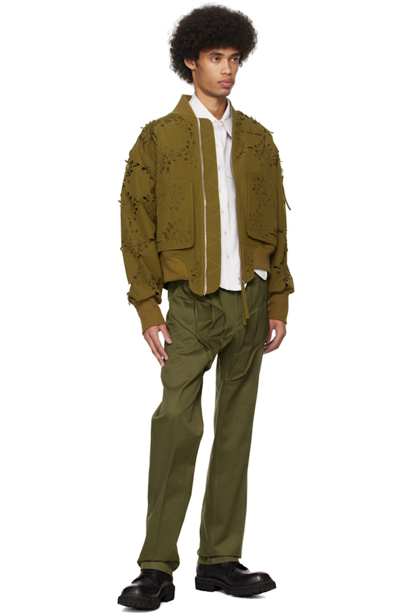 Polyester- and cotton-blend canvas bomber jacket. Laser-cut floral detailing throughout.

· Paneled construction
· Rib knit stand collar, asymmetric hem, and cuffs
· Two-way zip closure
· Loops at chest
· Welt and patch pockets
· Dropped shoulders
· Utility pocket and logo flag at sleeve
· Welt pocket at interior
· Full polyester taffeta lining

Supplier color: Yellow/Green