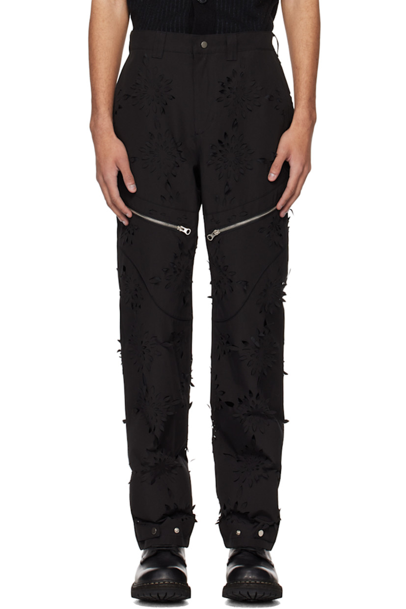Polyester- and cotton-blend canvas trousers. Laser-cut floral detailing throughout.

· Paneled construction
· Belt loops
· Four-pocket styling
· Zip-fly
· Zip pocket at front legs
· Adjustable press-stud tab at cuffs
· Full polyester taffeta lining

Supplier color: Black