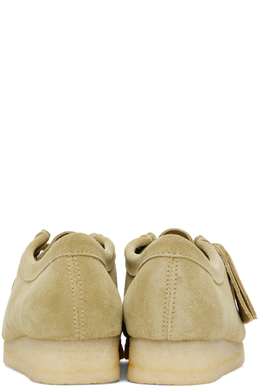 Suede derbys in taupe.

· Square moc toe
· Logo tags at lace-up closure
· Bellows tongue
· Grained leather lining
· Crepe rubber sole

Supplier color: Maple suede