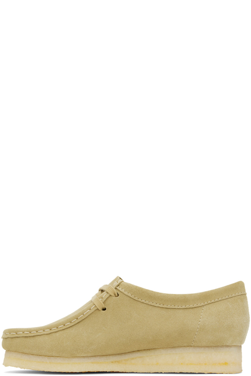 Suede derbys in taupe.

· Square moc toe
· Logo tags at lace-up closure
· Bellows tongue
· Grained leather lining
· Crepe rubber sole

Supplier color: Maple suede