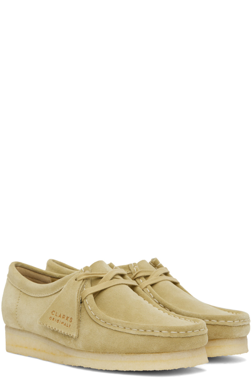 Suede derbys in taupe.

· Square moc toe
· Logo tags at lace-up closure
· Bellows tongue
· Grained leather lining
· Crepe rubber sole

Supplier color: Maple suede
