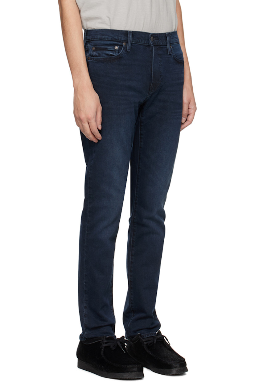 Slim-fit Levi's® Flex Eco Performance stretch cotton-blend denim jeans. Fading and whiskering throughout.

· Low-rise
· Belt loops
· Five-pocket styling
· Zip-fly
· Leather logo patch at back waistband
· Logo flag at back pocket

Supplier color: Dark wash