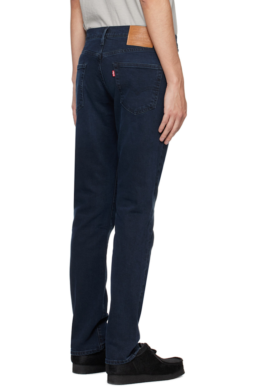 Slim-fit Levi's® Flex Eco Performance stretch cotton-blend denim jeans. Fading and whiskering throughout.

· Low-rise
· Belt loops
· Five-pocket styling
· Zip-fly
· Leather logo patch at back waistband
· Logo flag at back pocket

Supplier color: Dark wash