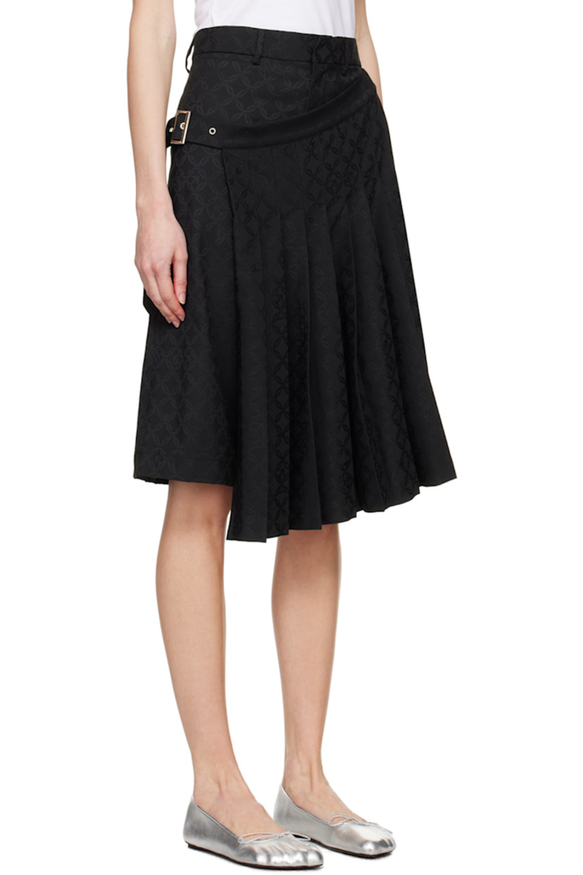 Stretch recycled polyester- and viscose-blend twill skort. Jacquard graphic pattern throughout.

· Layered construction
· Belt loops
· Three-pocket styling
· Zip-fly
· Pin-buckle fastening at pleated skirt-style overlay
· Logo patch at back

Supplier color: Black jacquard