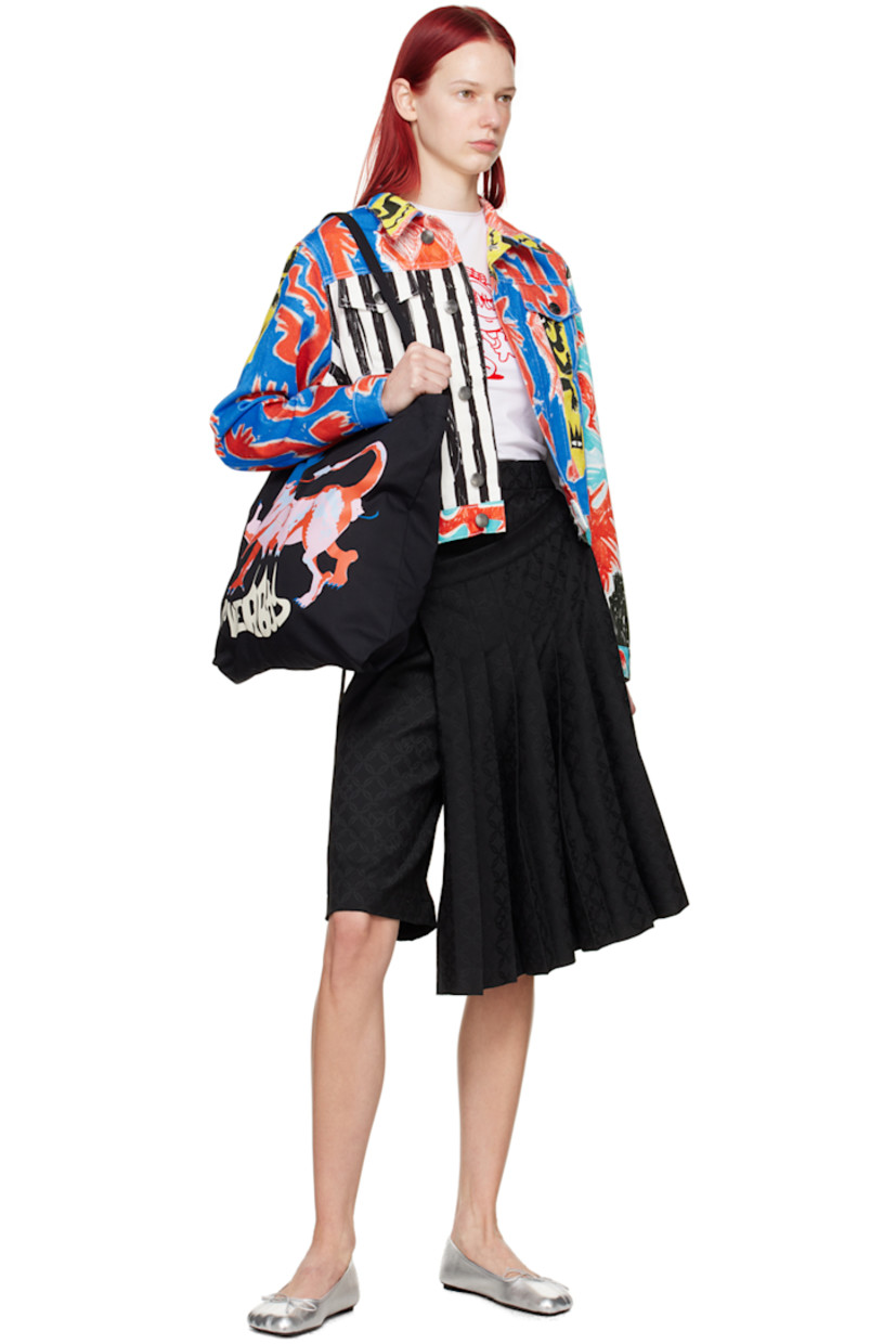 Stretch recycled polyester- and viscose-blend twill skort. Jacquard graphic pattern throughout.

· Layered construction
· Belt loops
· Three-pocket styling
· Zip-fly
· Pin-buckle fastening at pleated skirt-style overlay
· Logo patch at back

Supplier color: Black jacquard