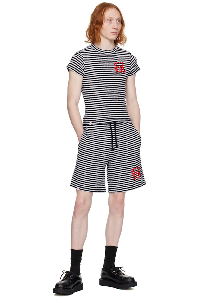 Stretch cotton- and nylon-blend terrycloth shorts. Stripes throughout. 

· Drawstring at waistband 
· Two-pocket styling 
· Logo embroidered at front 
· Logo flag at front 

Supplier colour: Black/White