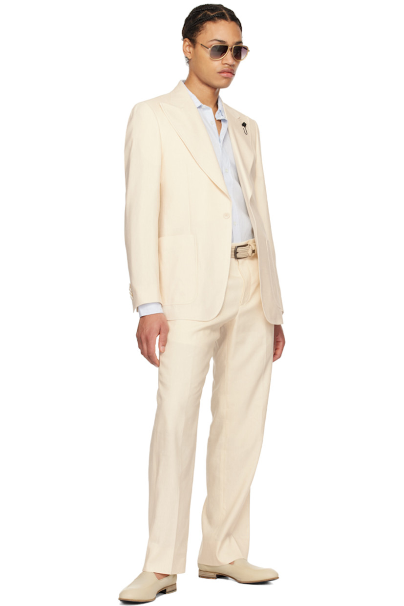 Plain-woven linen shirt.

· Spread collar
· Button closure
· Shirttail hem
· Single-button barrel cuffs

Supplier color: Light blue