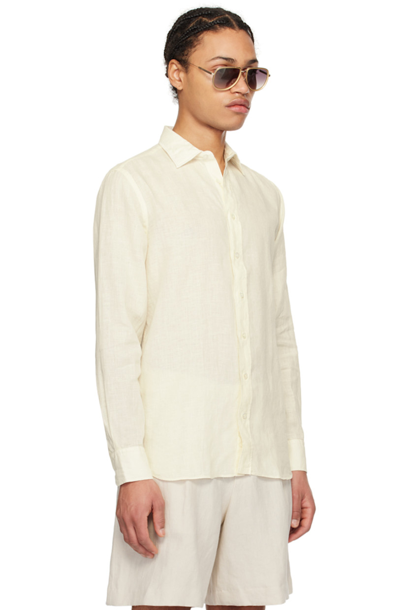Plain-woven linen shirt.

· Spread collar
· Button closure
· Shirttail hem
· Single-button barrel cuffs

Supplier color: Ecru