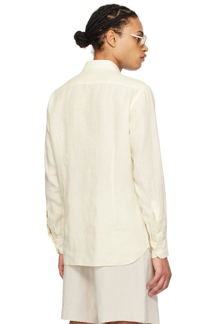 Plain-woven linen shirt.

· Spread collar
· Button closure
· Shirttail hem
· Single-button barrel cuffs

Supplier color: Ecru