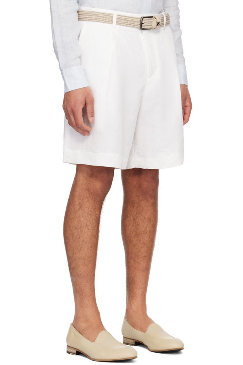 Plain-woven slub linen-blend shorts.

· Belt loops
· Four-pocket styling
· Zip-fly
· Pleats at front

Supplier color: White