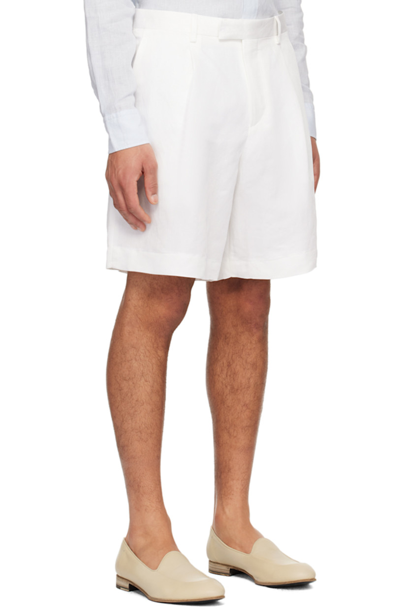 Plain-woven slub linen-blend shorts.

· Belt loops
· Four-pocket styling
· Zip-fly
· Pleats at front

Supplier color: White