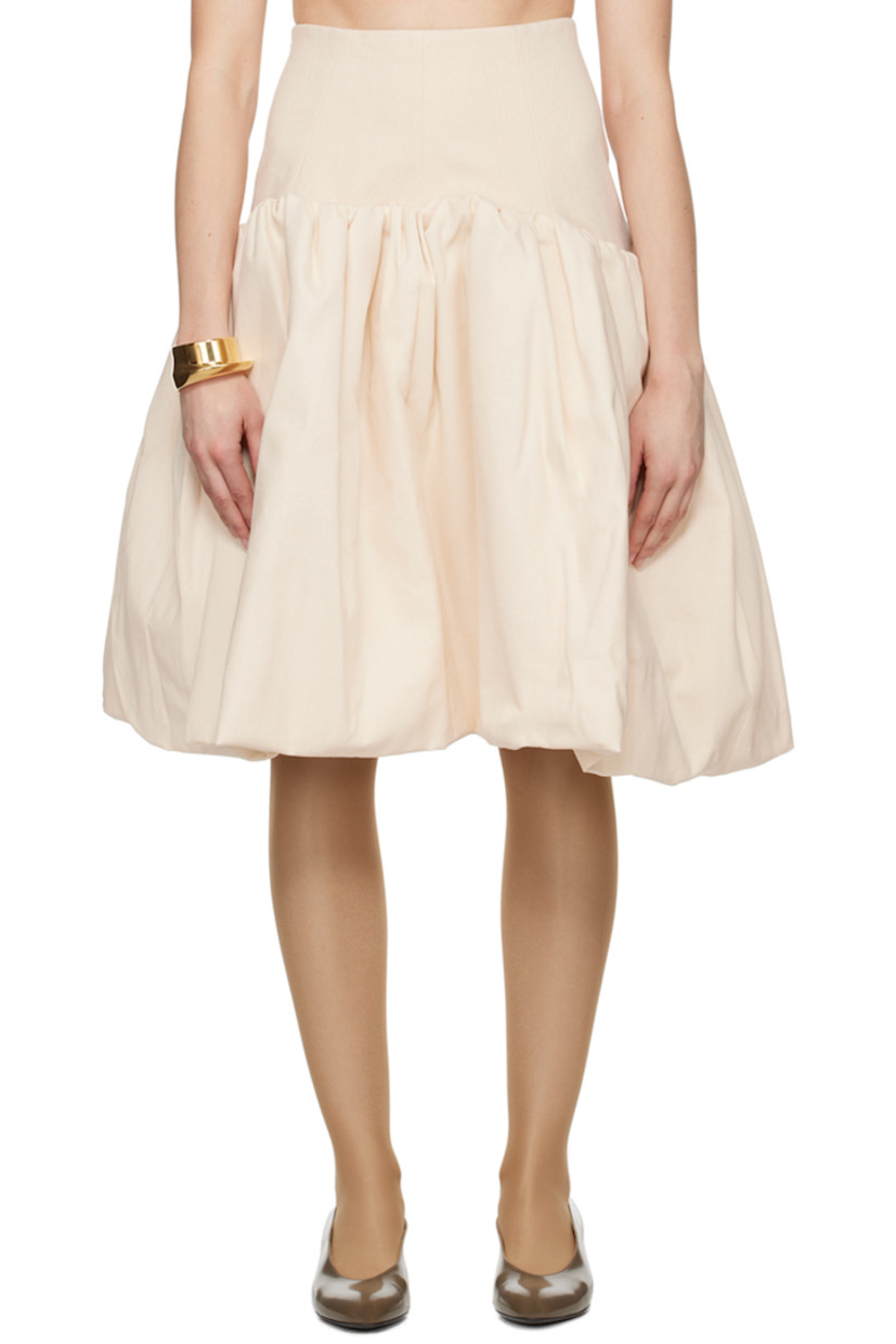 Stretch cotton twill and cotton canvas skirt. Gathering throughout. 

· Paneled construction
· Concealed zip closure at back
· Partial broadcloth lining

Supplier color: White