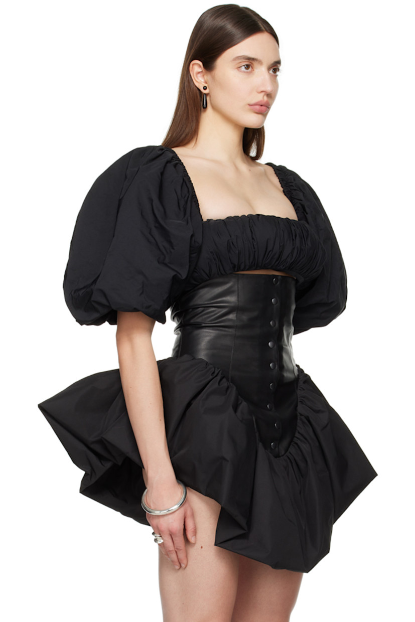 Padded polyester twill blouse. Gathering throughout. 

· Square neck
· Cropped hem
· Puff sleeves
· Press-stud closure at back
· Partial broadcloth lining

Supplier color: Black