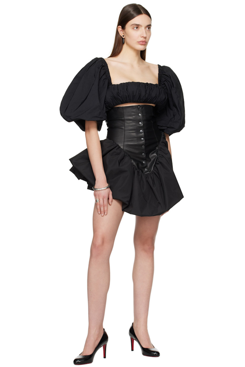 Padded polyester twill blouse. Gathering throughout. 

· Square neck
· Cropped hem
· Puff sleeves
· Press-stud closure at back
· Partial broadcloth lining

Supplier color: Black