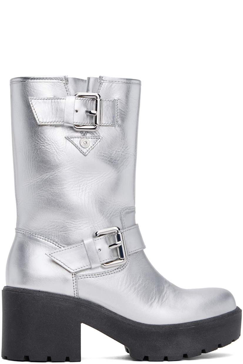 Calf-high grained leather boots in metallic silver tone.

· Pin-buckle strap at ankle and collar
· Logo hardware at outer side
· Buffed leather lining
· Foam rubber block heel
· Treaded foam rubber platform sole
· Platform: H1"
· Heel: H2.5"

Supplier color: Silver