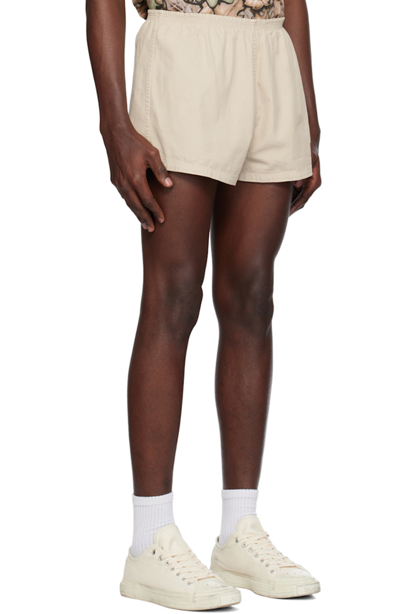 Lightweight garment-dyed cotton- and linen-blend twill shorts.

· Elasticized waistband
· Logo patch at leg

Supplier color: Ecru