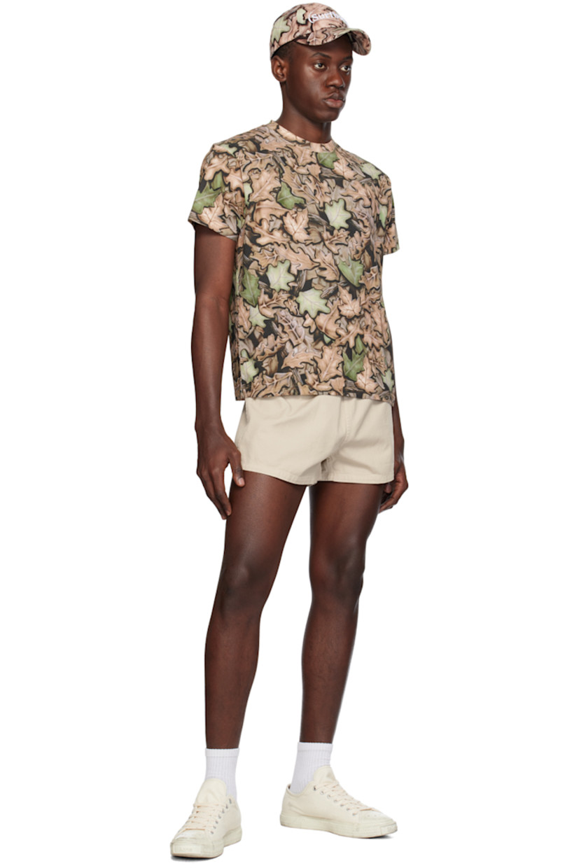 Lightweight garment-dyed cotton- and linen-blend twill shorts.

· Elasticized waistband
· Logo patch at leg

Supplier color: Ecru