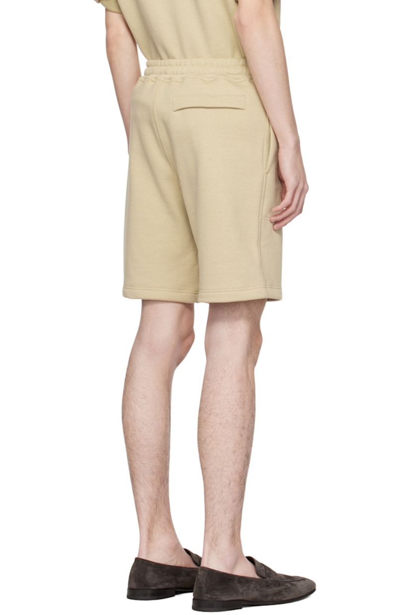 French terry shorts.

· Concealed drawstring at elasticized waistband
· Three-pocket styling
· Mock-fly
· Logo embroidered at front

Supplier color: Beige medio