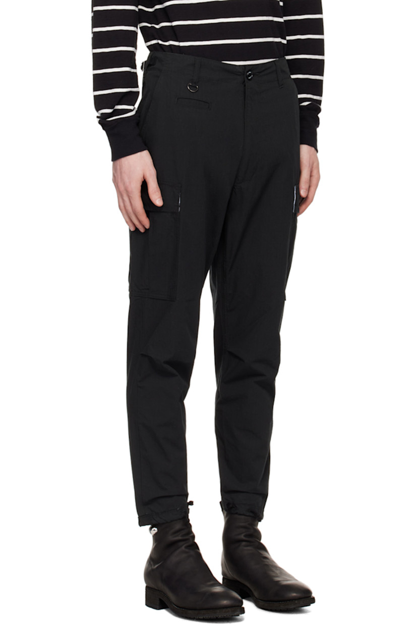 Cotton-blend broadcloth cargo pants. 

· D-ring and cinch tabs at waistband
· Belt loops
· Five-pocket styling
· Logo appliqué at leg 
· Pleats at knees
· Drawstring and vent at cuffs
· Cargo pocket at outseams 
· Concealed zip pocket at outseam
· Logo embroidered at back 

Supplier color: Black