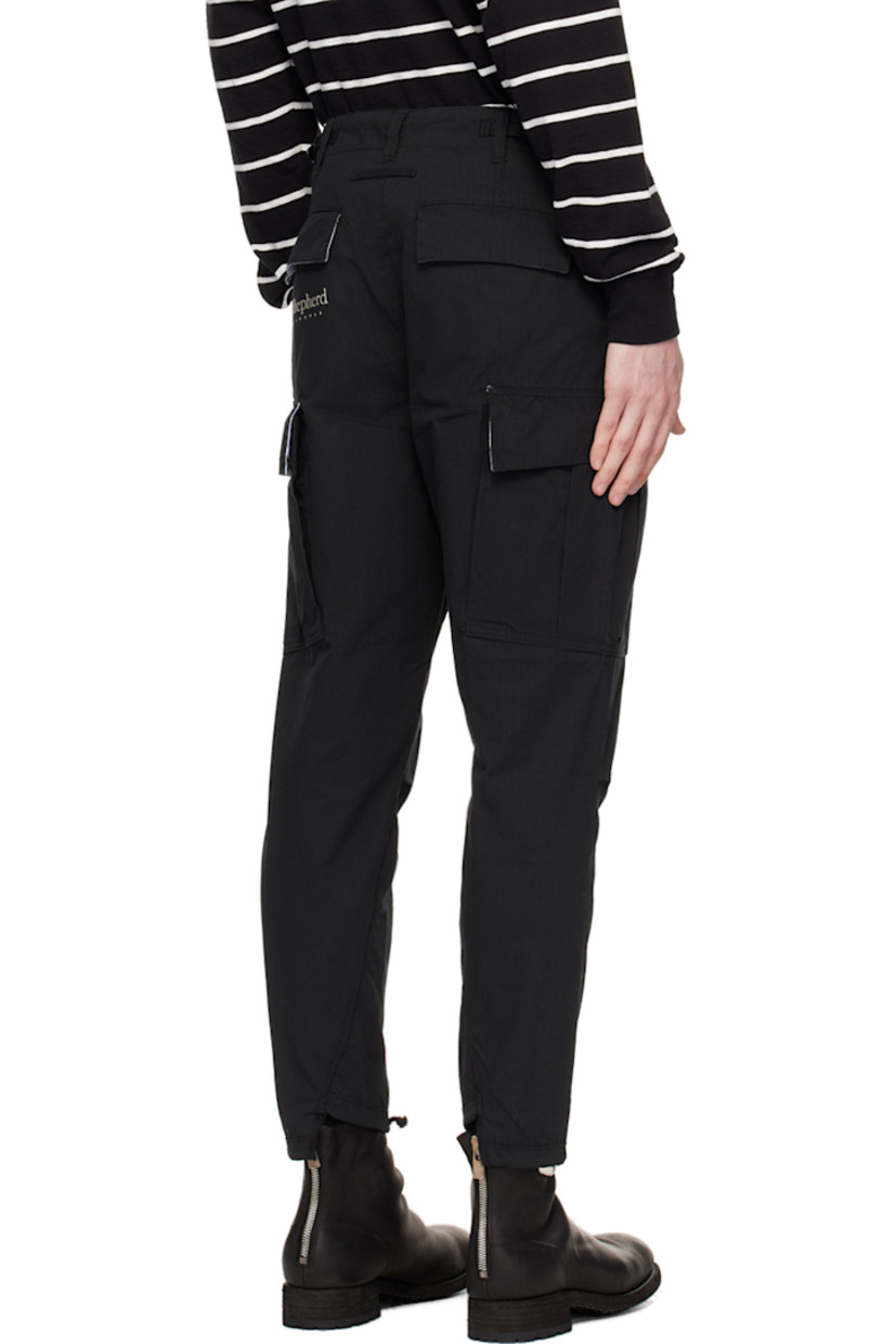 Cotton-blend broadcloth cargo pants. 

· D-ring and cinch tabs at waistband
· Belt loops
· Five-pocket styling
· Logo appliqué at leg 
· Pleats at knees
· Drawstring and vent at cuffs
· Cargo pocket at outseams 
· Concealed zip pocket at outseam
· Logo embroidered at back 

Supplier color: Black