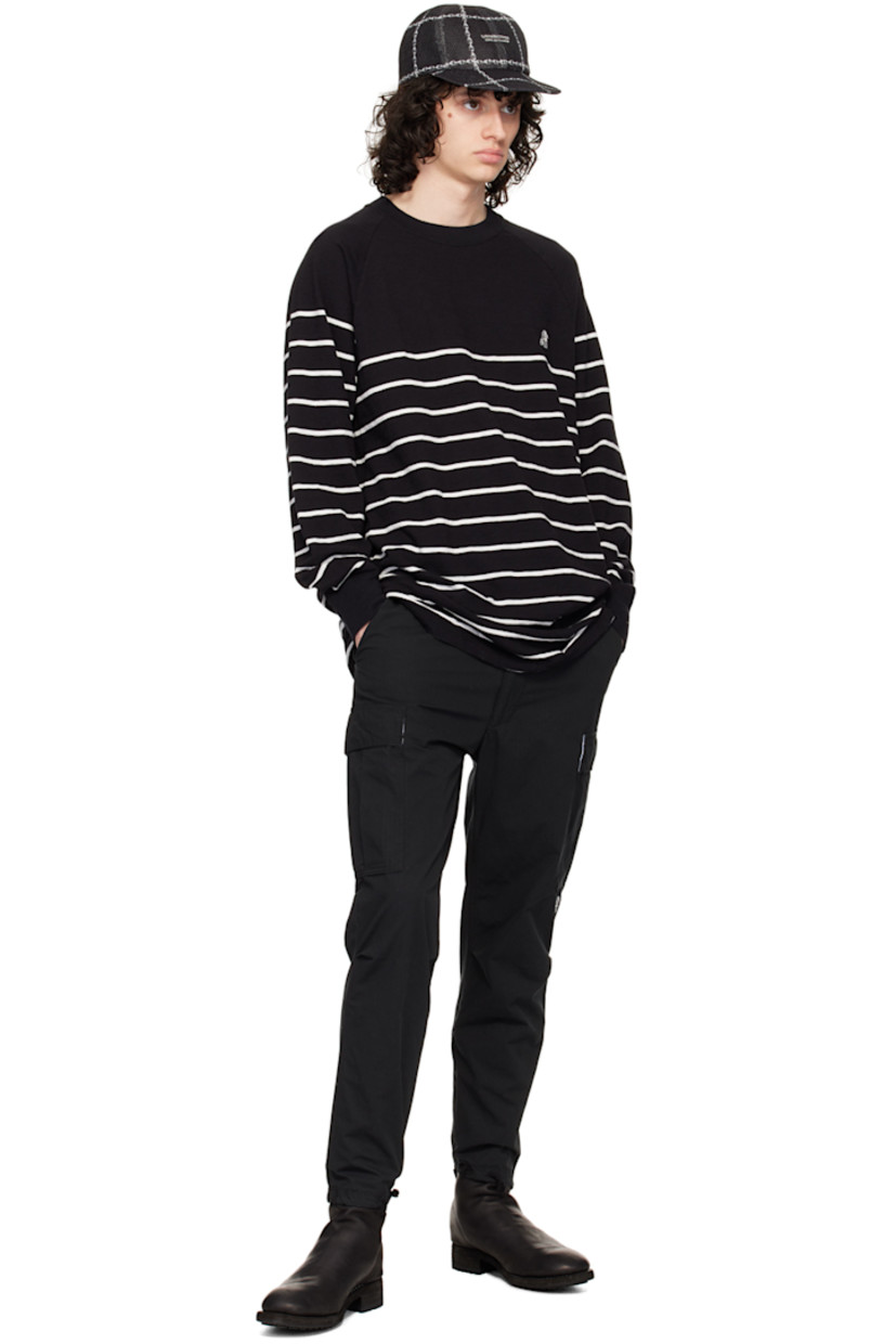 Cotton-blend broadcloth cargo pants. 

· D-ring and cinch tabs at waistband
· Belt loops
· Five-pocket styling
· Logo appliqué at leg 
· Pleats at knees
· Drawstring and vent at cuffs
· Cargo pocket at outseams 
· Concealed zip pocket at outseam
· Logo embroidered at back 

Supplier color: Black