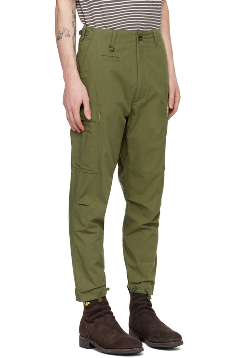 Cotton-blend broadcloth cargo pants. 

· D-ring and cinch tabs at waistband
· Belt loops
· Five-pocket styling 
· Logo appliqué at leg
· Pleats at knees
· Drawstring and vent at cuffs
· Cargo pocket at outseams 
· Concealed zip pocket at outseam
· Logo embroidered at back 

Supplier color: Khaki
