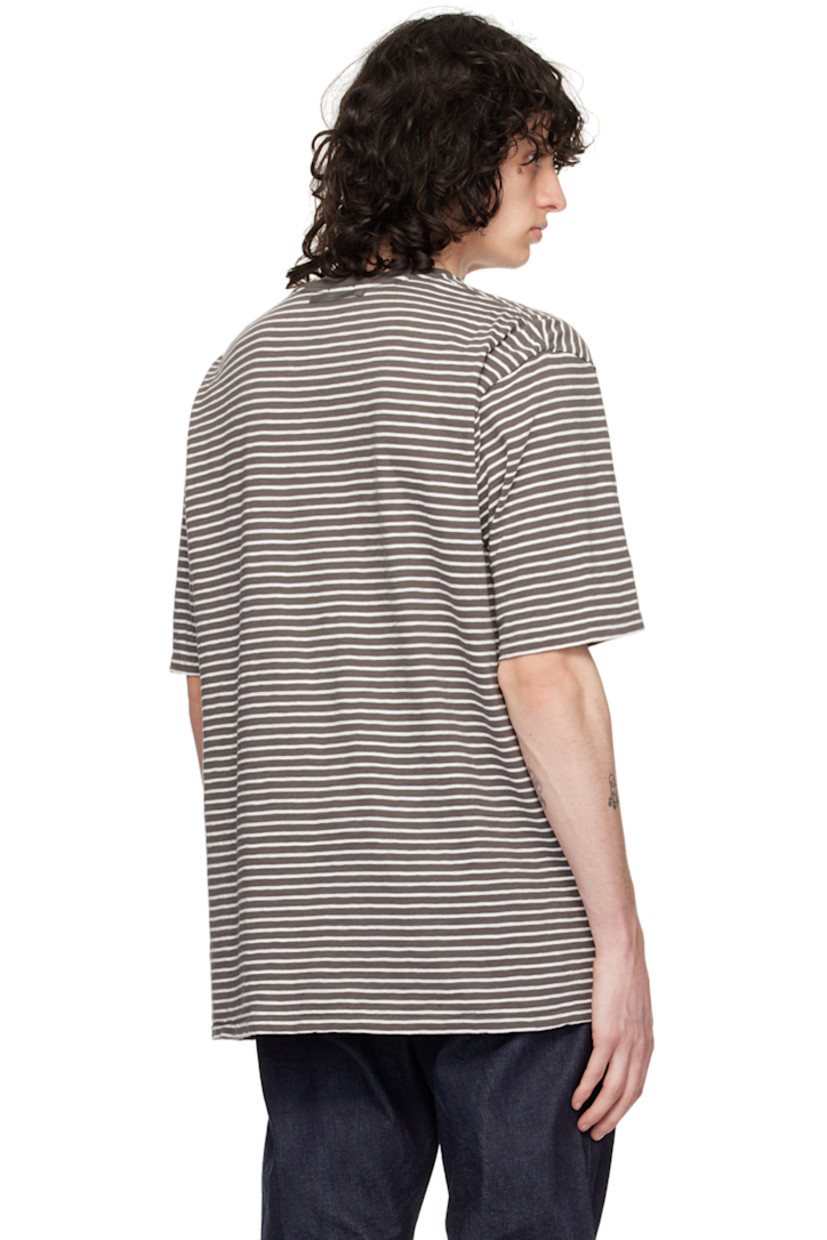 Cotton jersey T-shirt. Stripes throughout.

· Rib knit crewneck
· Logo appliqué at patch pocket
· Seam pocket 
· Locker loop at back collar

Supplier color: Gray border