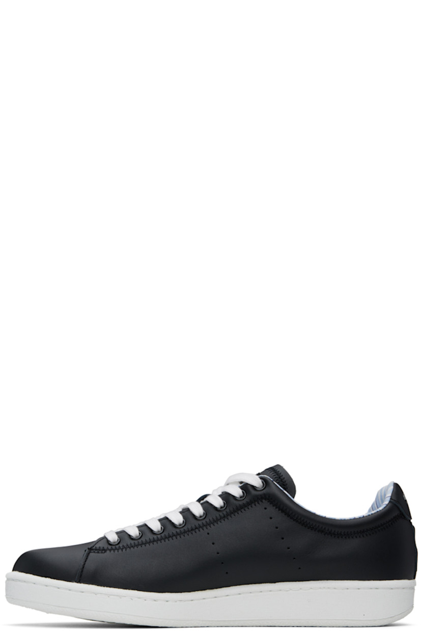 Low-top buffed leather sneakers in black.

· Lace-up closure
· Logo patch at padded tongue
· Padded collar
· Perforated detailing at sides
· Embroidered graphic at outer side
· Logo printed at heel tab
· Pull-loop at heel counter
· Textured rubber midsole
· Treaded rubber sole

Supplier color: Black