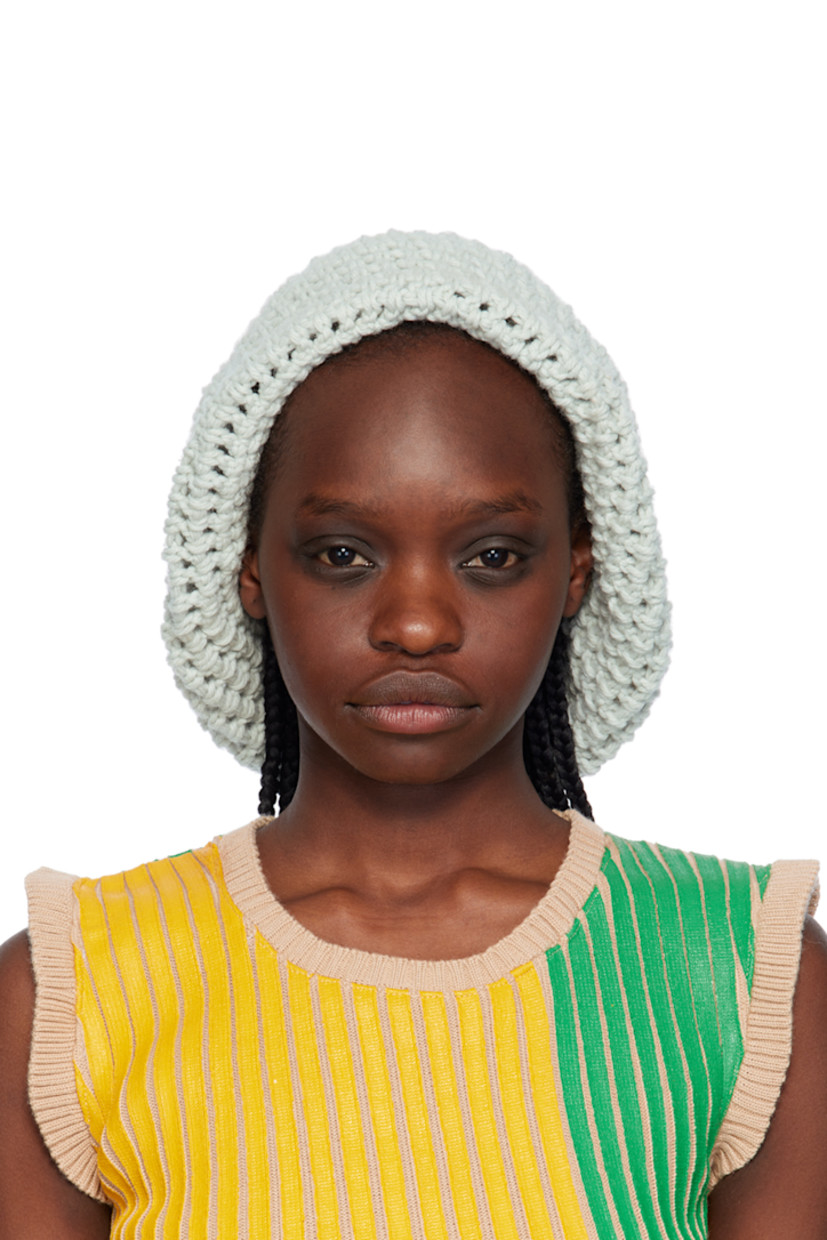 Crocheted virgin wool-blend beanie in blue and off-white.

Available exclusively at SSENSE. 

Supplier color: Cream