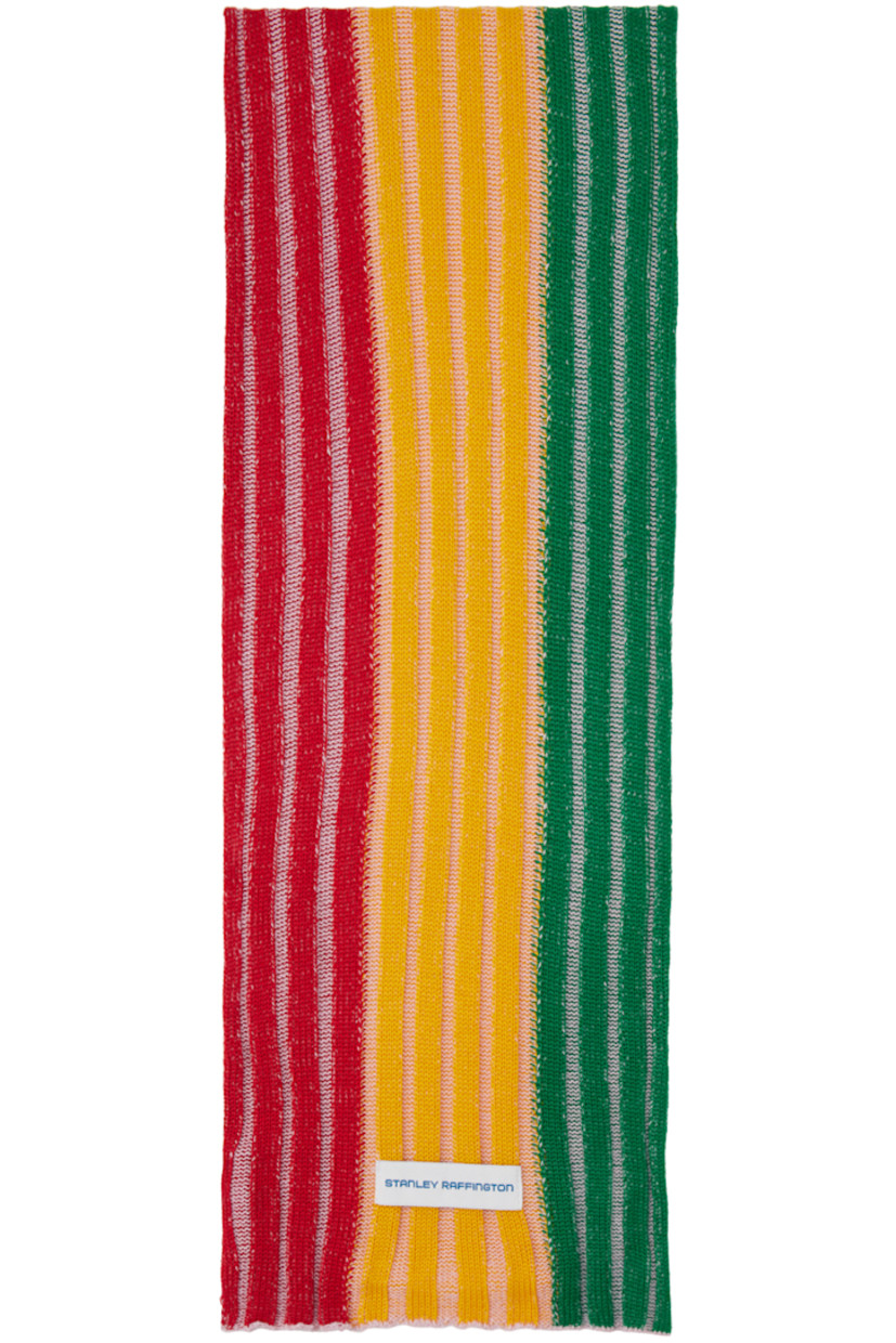 Rectangular rib knit merino wool- and acrylic-blend scarf in red, yellow, and green.

· Lettuce edge at ends
· Logo patch at end
· L75" x W9"

Available exclusively at SSENSE.

Supplier color: Red/Gold/Green