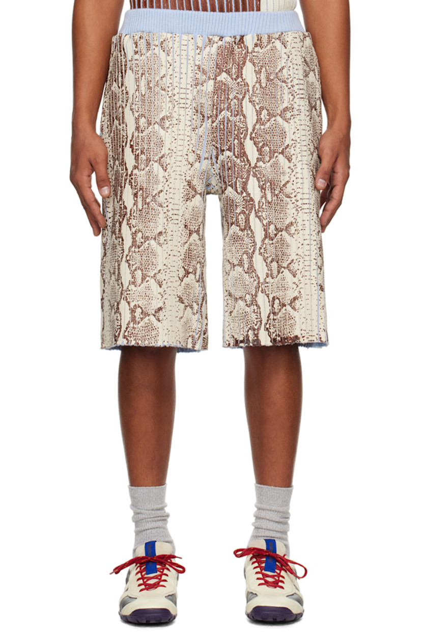 Hand-coated rib knit merino wool shorts. Graphic pattern throughout.

· Elasticized waistband
· Three-pocket styling

Available exclusively at SSENSE.

Supplier color: Snakeskin