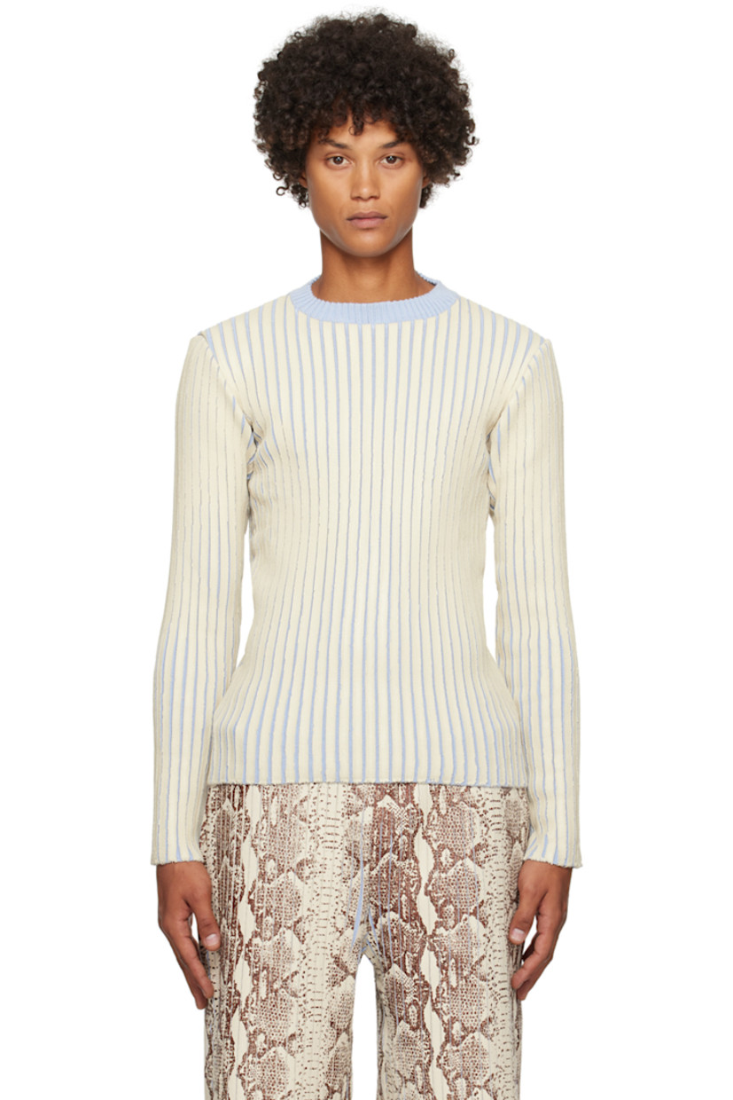 Hand-coated rib knit merino wool sweater. Crewneck.

Available exclusively at SSENSE. 

Supplier color: Cream
