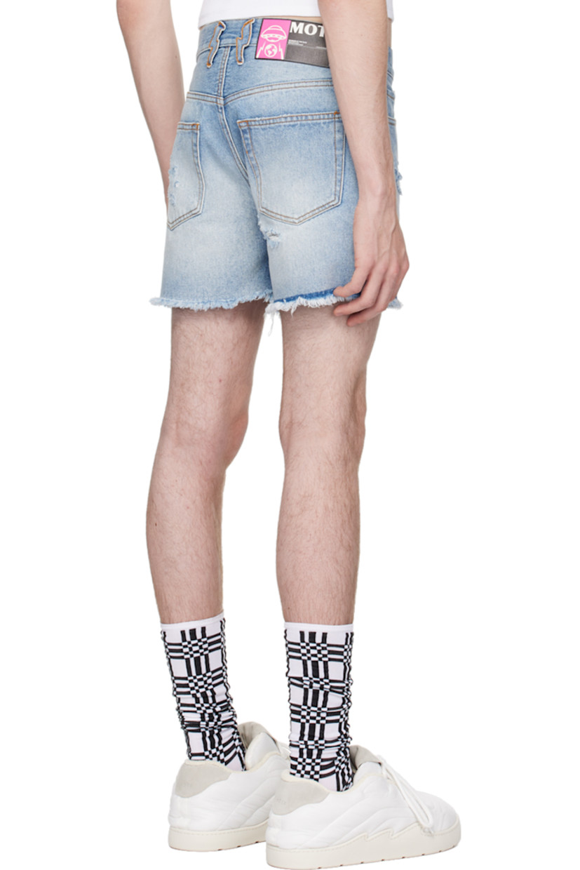 Non-stretch denim shorts. Fading, whiskering, and distressing throughout. 

· Belt loops 
· Five-pocket styling 
· Button-fly 
· Frayed edges at cuffs 
· Leather logo patch at back waistband 
· Contrast stitching in tan

Supplier color: Light blue