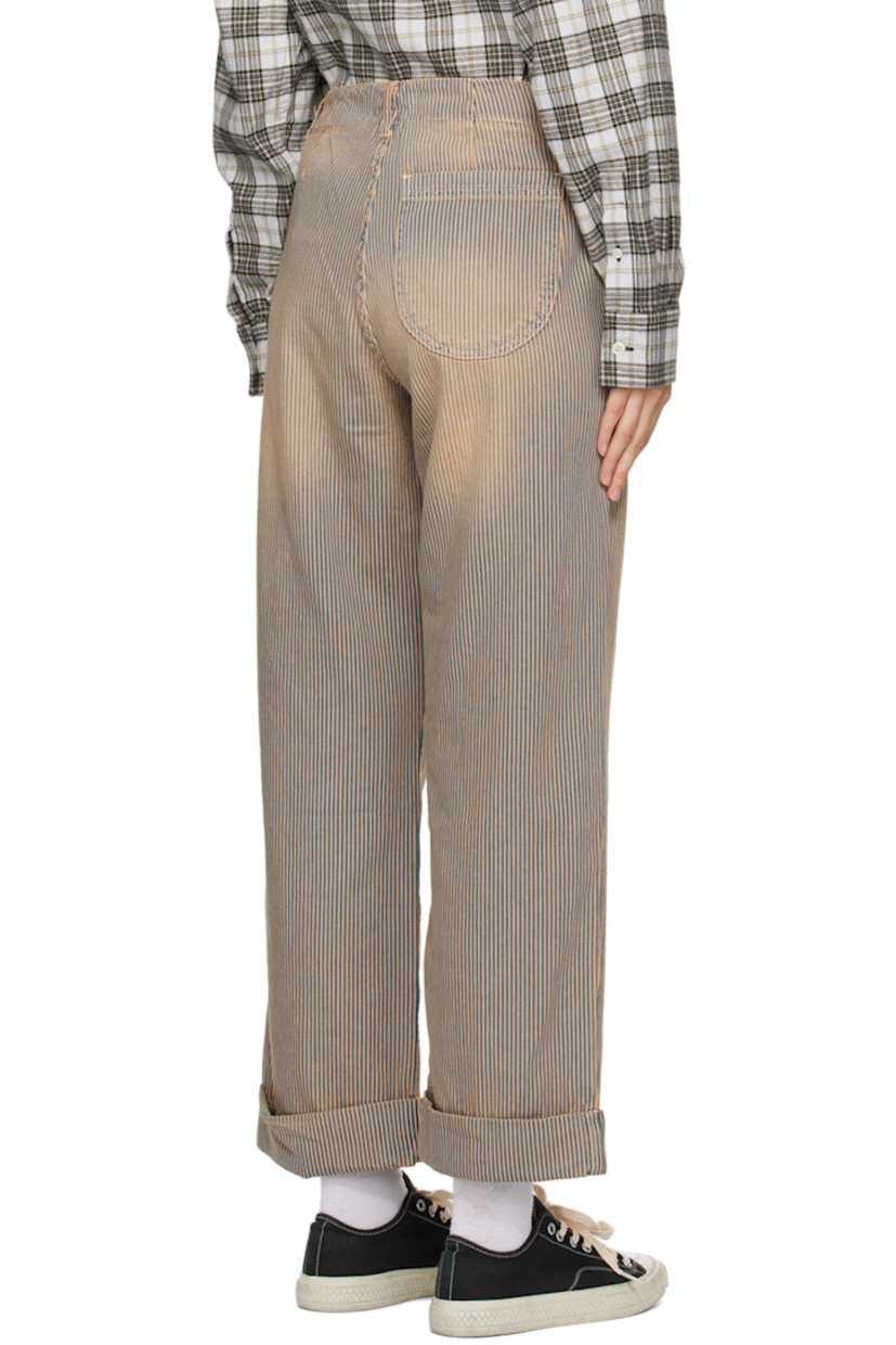 Straight-leg non-stretch denim trousers. Bleached effect and stripes throughout. 

· Belt loops
· Three-pocket styling
· Coin pocket at front waist
· Zip-fly
· Rolled cuffs

Supplier color: Navy/Brown