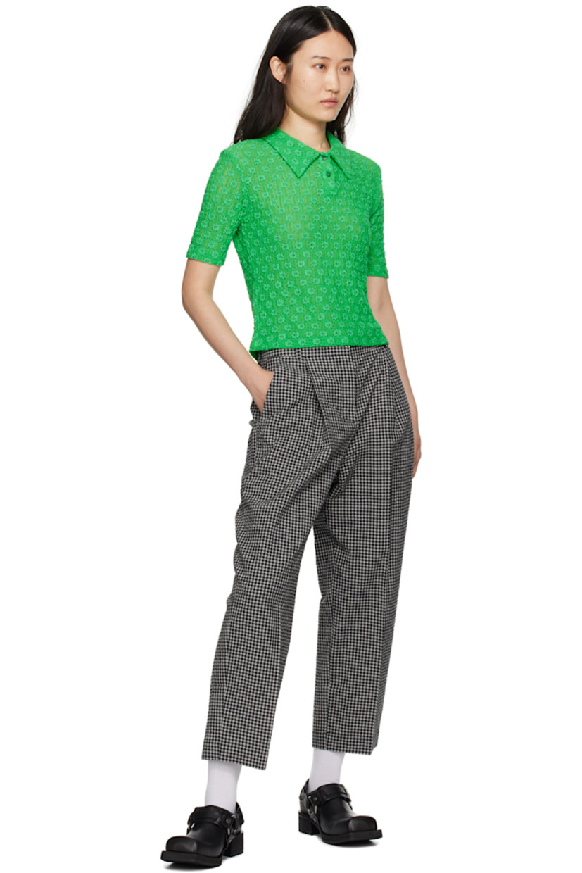 Plain-woven stretch nylon- and cotton-blend polo. Shirring and broderie anglaise detailing throughout. 

· Spread collar
· Two-button placket

Supplier color: Green
