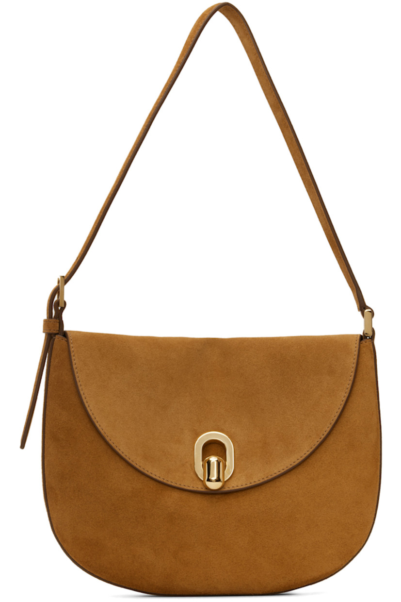 Handcrafted calfskin suede shoulder bag in tan.

· Adjustable pin-buckle shoulder strap
· Foldover flap·
· Magnetic tab-slot closure
· Card slot at interior
· Gold-tone hardware
· H7.5 x W10 x D1.5 in

Supplier color: Saddle