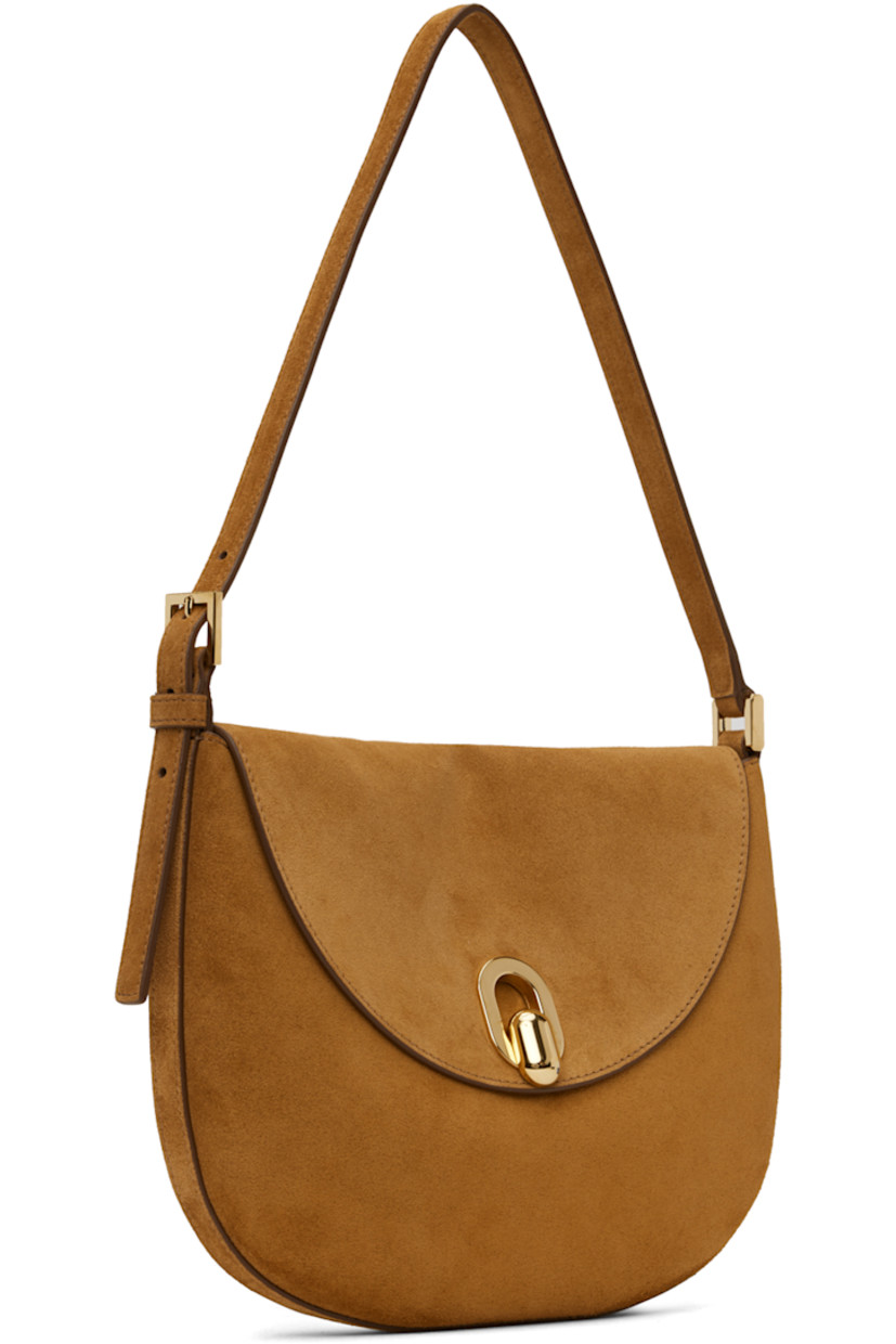 Handcrafted calfskin suede shoulder bag in tan.

· Adjustable pin-buckle shoulder strap
· Foldover flap·
· Magnetic tab-slot closure
· Card slot at interior
· Gold-tone hardware
· H7.5 x W10 x D1.5 in

Supplier color: Saddle
