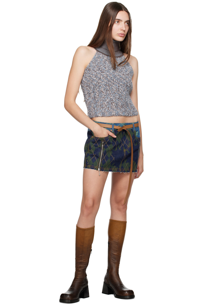Grained calfskin belt in tan. Pull-through fastening.

Supplier color: Tan