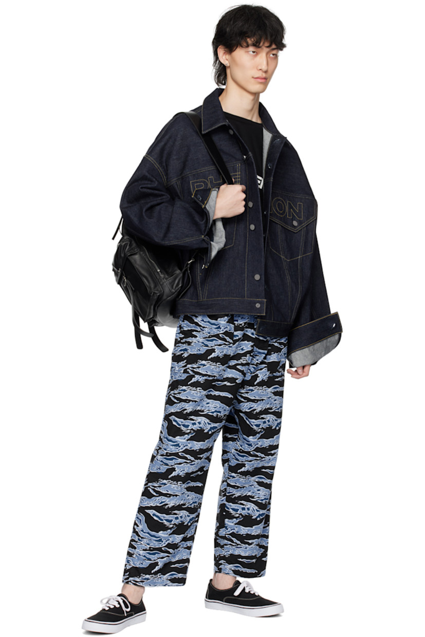 Cotton ripstop trousers. Graphic pattern throughout.

· Drawstring at elasticized waistband
· Four-pocket styling
· Zip-fly

Part of the Fumito Ganryu x PHENOMENON collaboration.

Supplier color: Blue