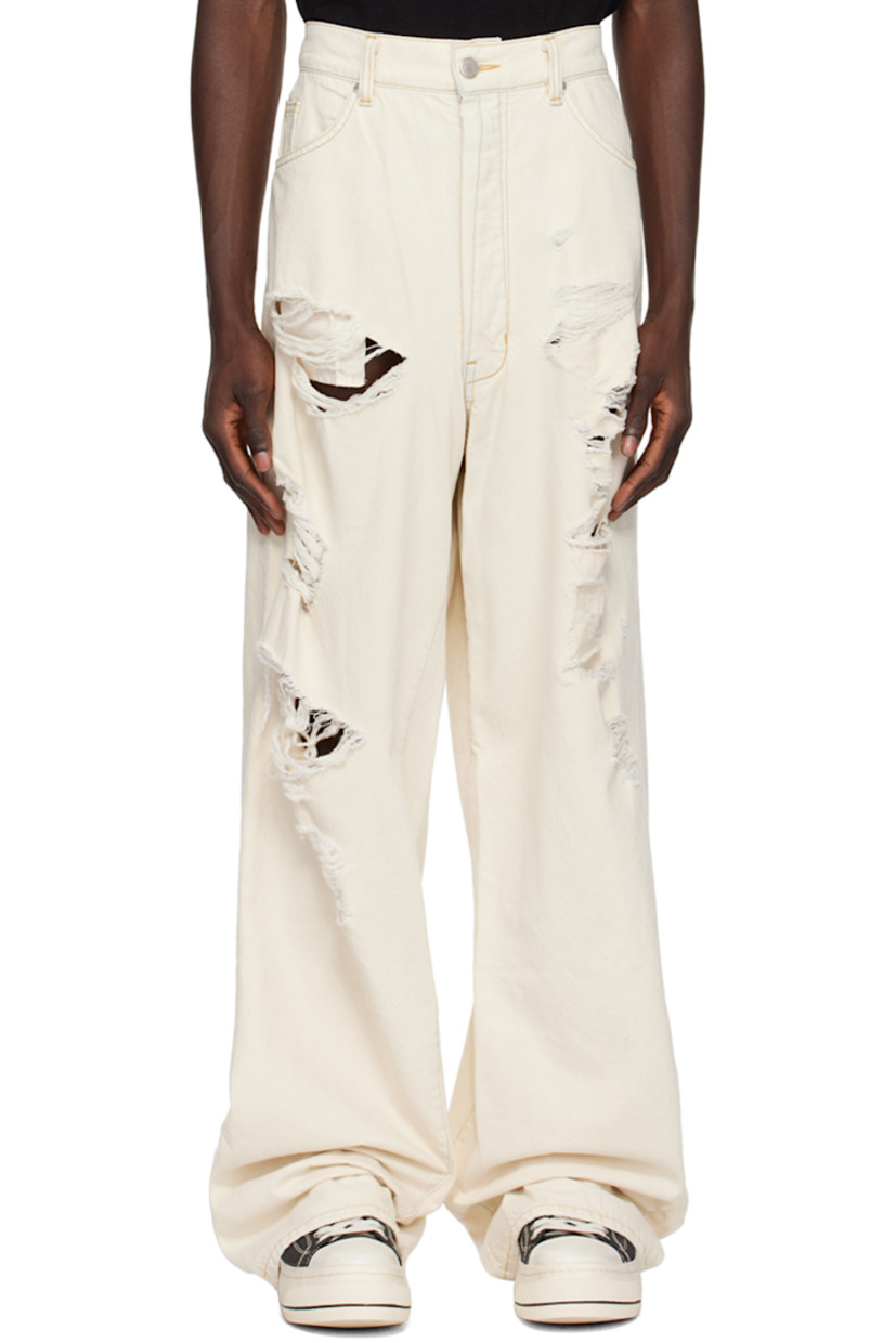Non-stretch denim jeans. Distressing throughout. 

· Belt loops
· Five-pocket styling
· Button-fly
· Twisted inseams and outseams
· Locker loop at back waistband
· Logo patches at back
· Contrast stitching in yellow

Supplier color: Wash 5
