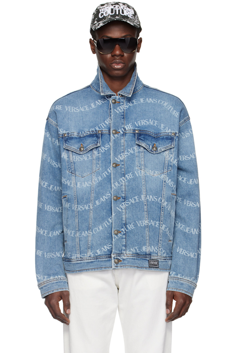 Stretch denim jacket. Printed logo pattern and fading throughout. 

· Pointed spread collar
· Button closure
· Flap and welt pockets
· Logo patch at front hem 
· Single-button barrel cuffs
· Leather logo patch at back hem 
· Logo-engraved antiqued gunmetal-tone hardware 
· Contrast stitching in tan 

Supplier color: Indigo