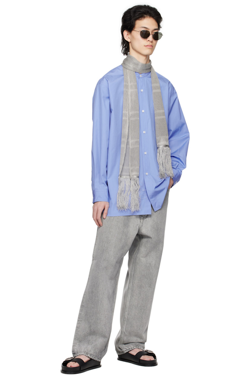 Cotton poplin shirt.

· Stand collar
· Button closure
· Patch pocket
· Vented shirttail hem
· Adjustable single-button barrel cuffs
· Box pleat at back yoke

Supplier color: Blue