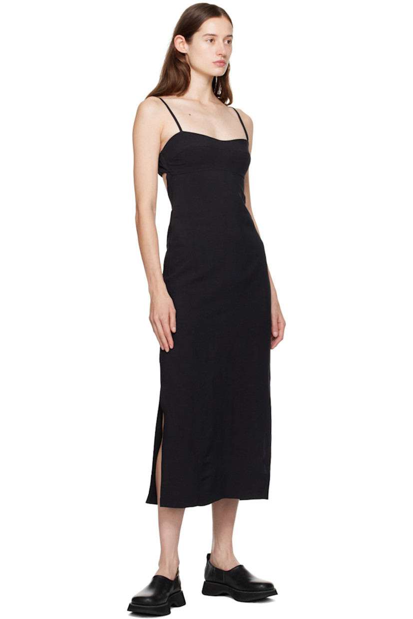Viscose- and linen-blend voile cover up. 

· Paneled construction
· Sweetheart neck 
· Zip closure at side seam
· Adjustable shoulder straps
· Cutout at elasticized back 
· Partially lined

Supplier color: Black