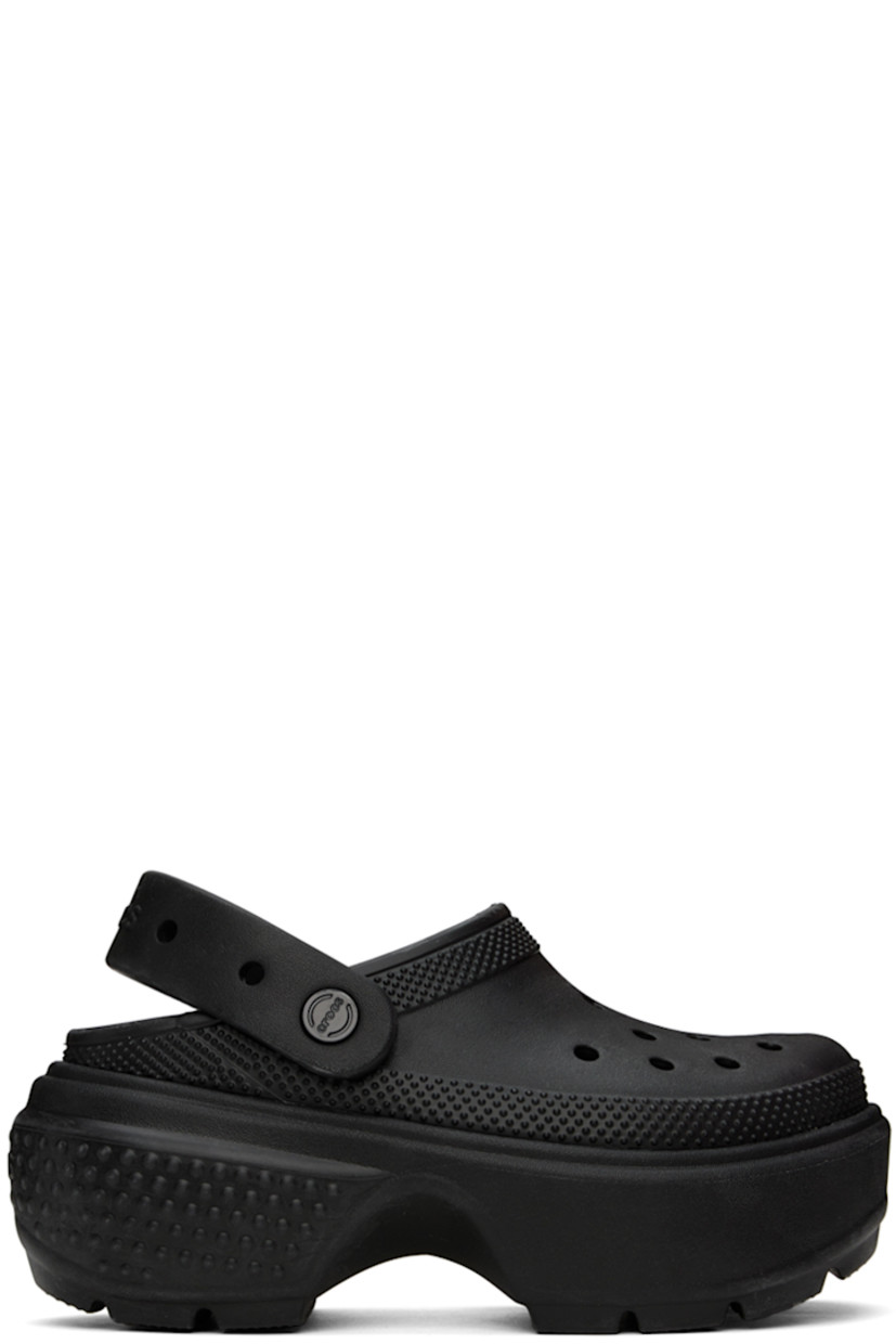 Lightweight Croslite™ EVA foam rubber slip-on sandals in black. 

· Perforated detailing at vamp
· Logo-embossed convertible slingback strap
· Logo embossed at heel 
· Molded rubber footbed
· Textured platform rubber midsole
· Treaded rubber sole
· Logo-engraved hardware
· Platform: H2.5"

Supplier color: Black