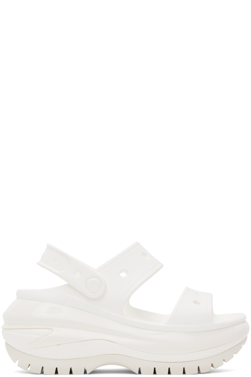 Lightweight foam rubber sandals in white.

· Open toe
· Perforated detailing at vamp
· Logo-embossed convertible slingback strap
· Logo embossed at heel counter
· Molded rubber footbed
· Sculptural platform foam rubber midsole
· Treaded rubber sole
· Platform: H2.5"

Supplier color: White